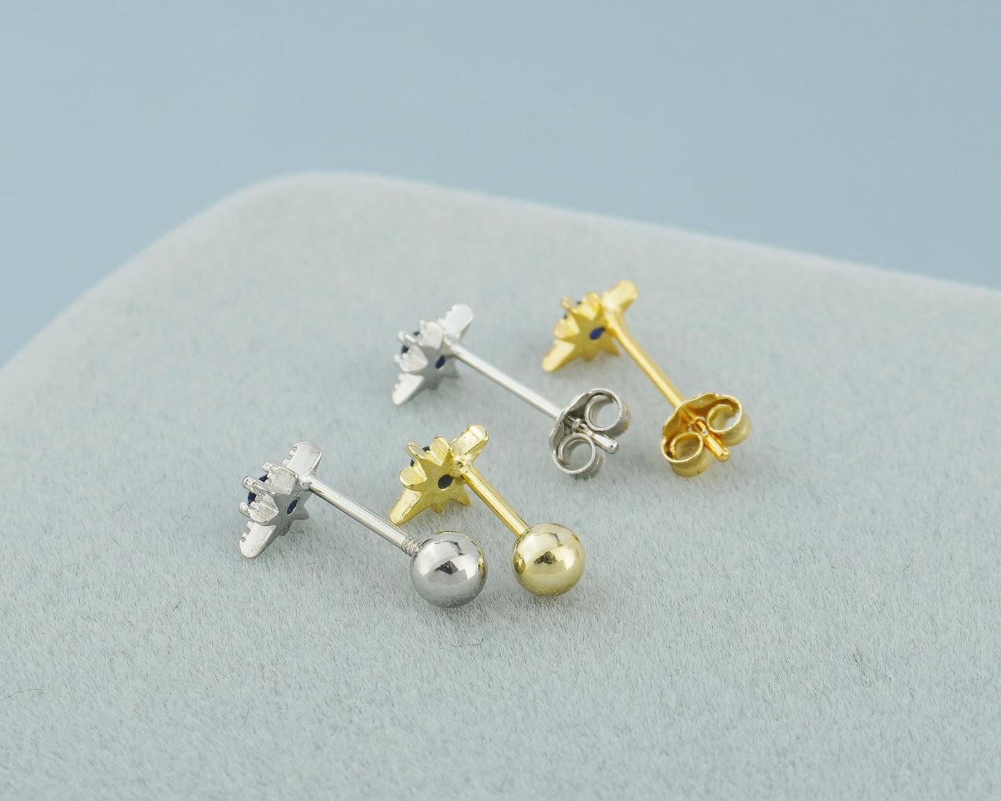 Pair of Tiny Sterling Silver Starburst Stud Earrings in Rhodium or Gold Plated, Celestial Star Burst Design with Blue CZ