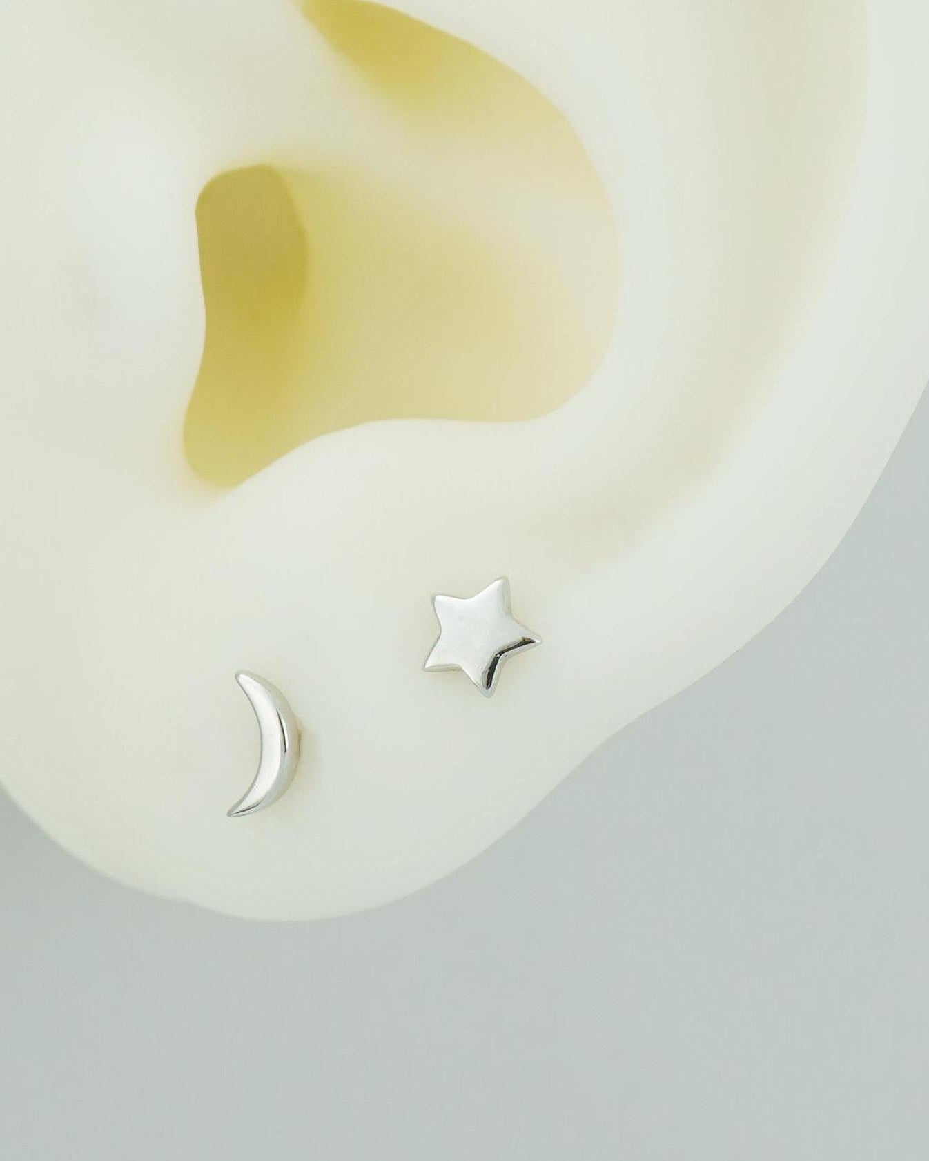 Pair of Sterling Silver Tiny Crescent Moon & Star Stud Earrings in Rhodium or 18ct Gold Plated, Mismatched Asymmetric Design