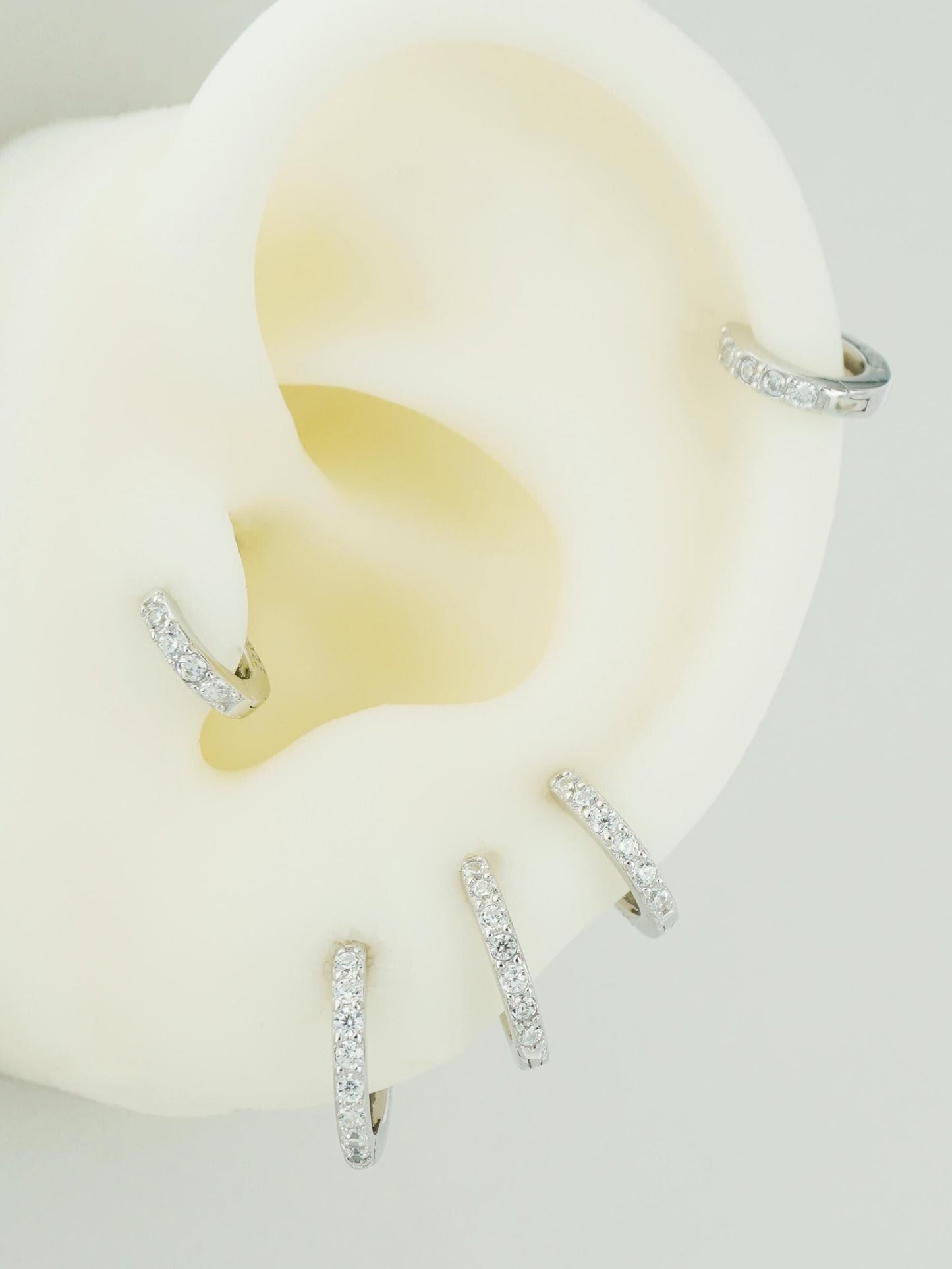 Pair of Skinny CZ Paved Huggie Hoop Earrings in 5 Sizes, Gold or Rhodium Plated Sterling Silver