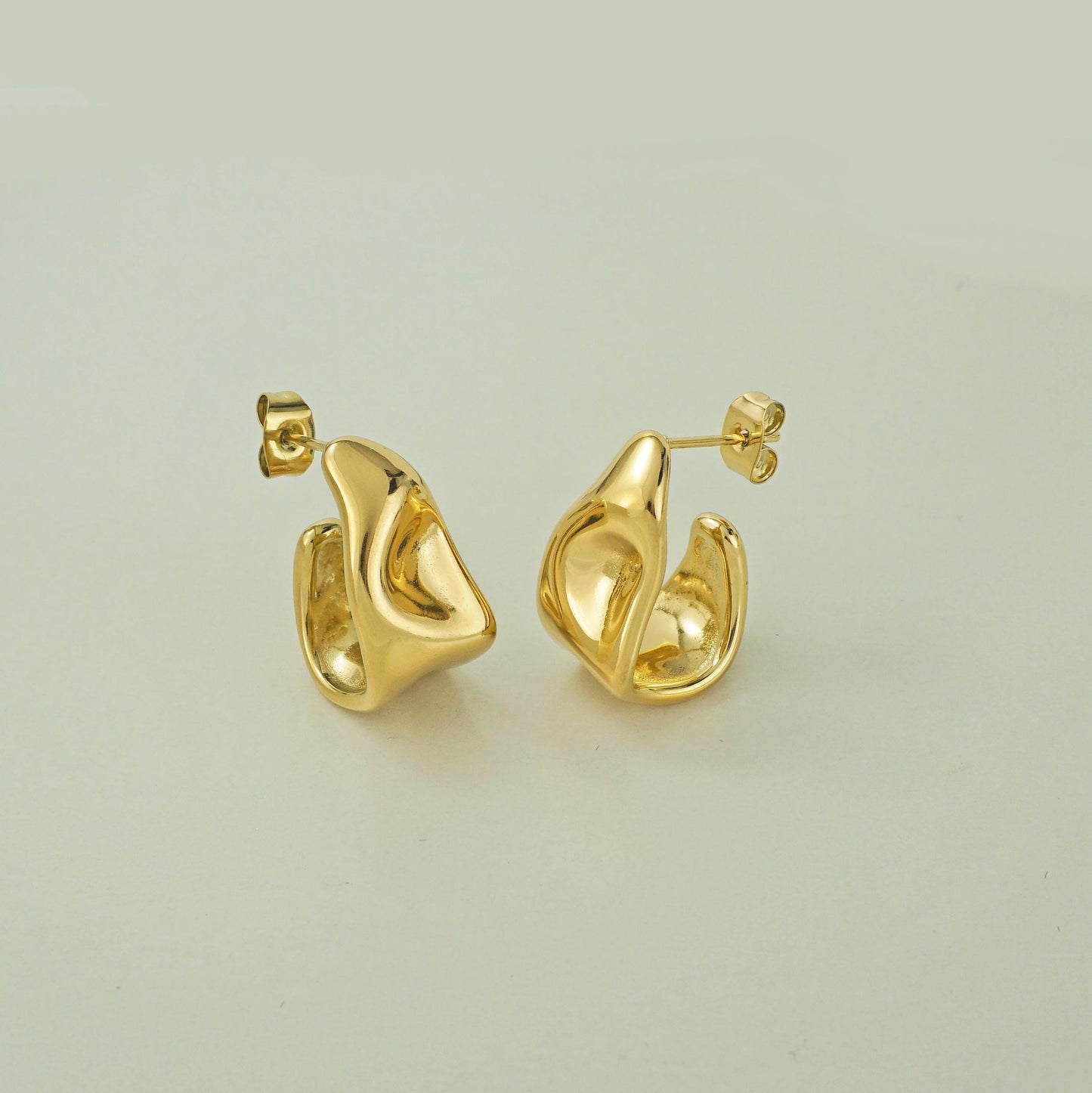 Pair of Stainless Steel Molten Chunk Melted Half Hoop Twisted Stud Earrings in Steel or Golden Finishes