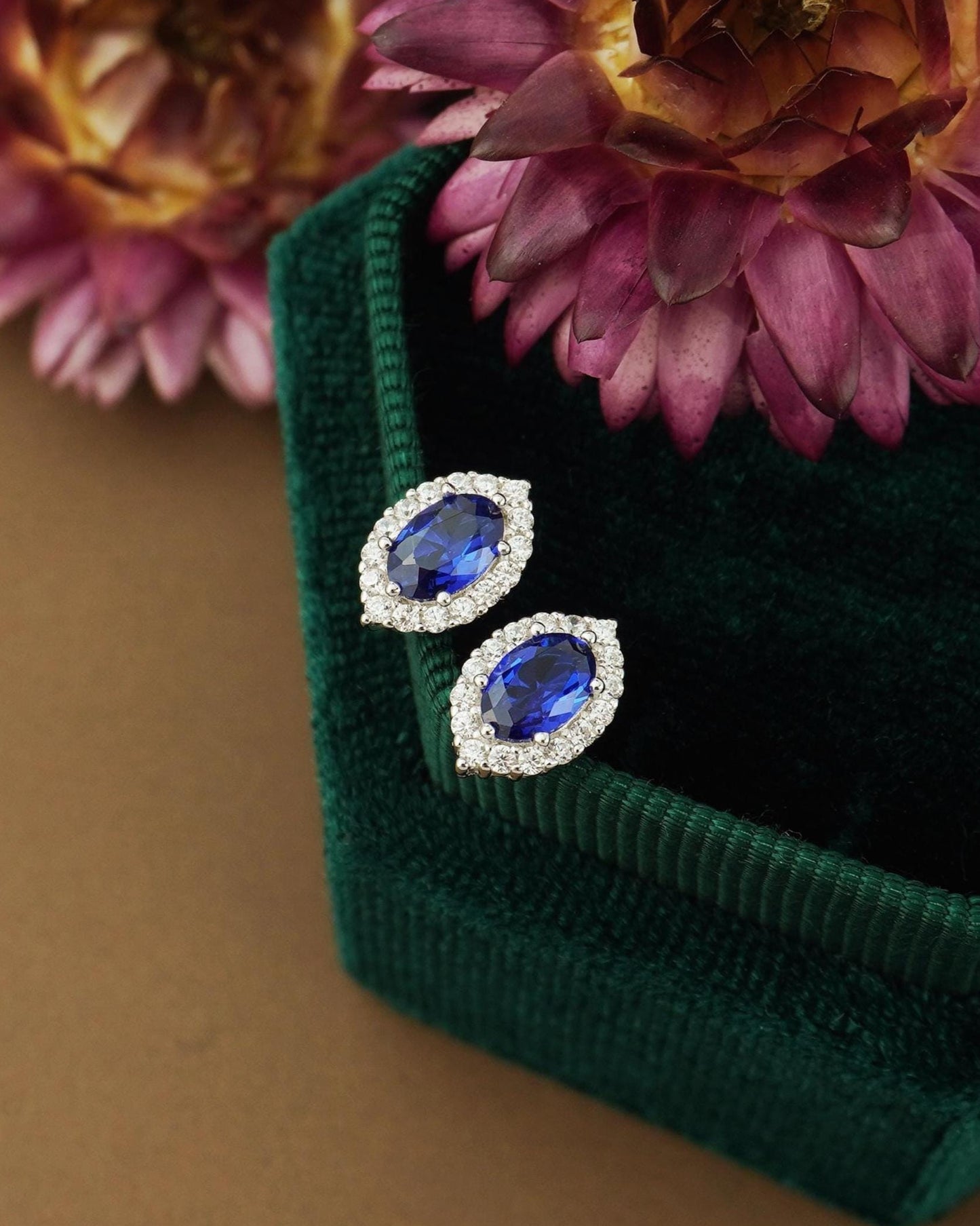 Pair of Marquise-shaped Stud Earrings Featuring a Central Blue Gemstone Surrounded by a Halo of CZ Accents, 14ct Gold Plated/Sterling Silver