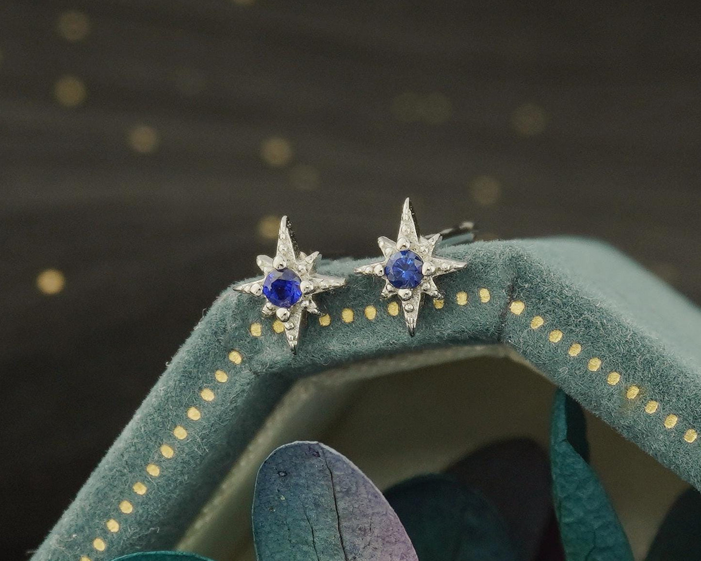 Pair of Tiny Sterling Silver Starburst Stud Earrings in Rhodium or Gold Plated, Celestial Star Burst Design with Blue CZ