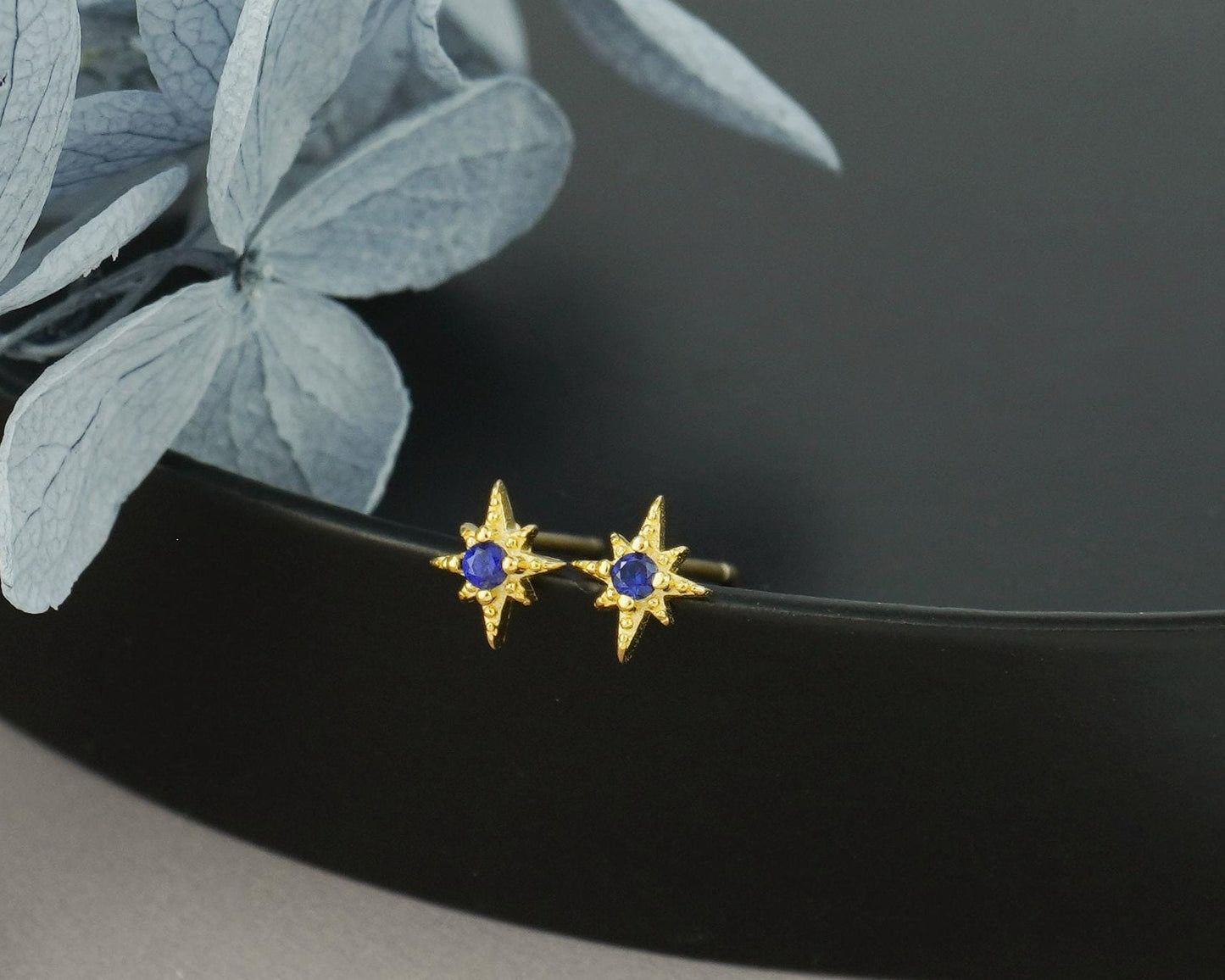 Pair of Tiny Sterling Silver Starburst Stud Earrings in Rhodium or Gold Plated, Celestial Star Burst Design with Blue CZ