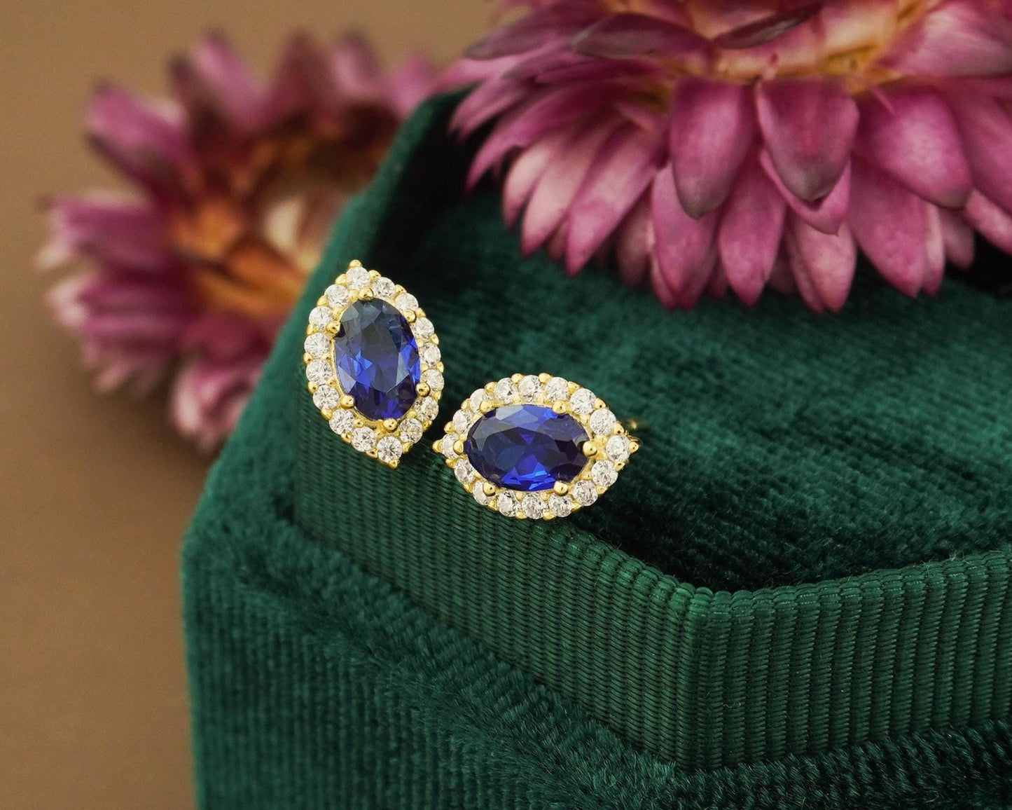Pair of Marquise-shaped Stud Earrings Featuring a Central Blue Gemstone Surrounded by a Halo of CZ Accents, 14ct Gold Plated/Sterling Silver