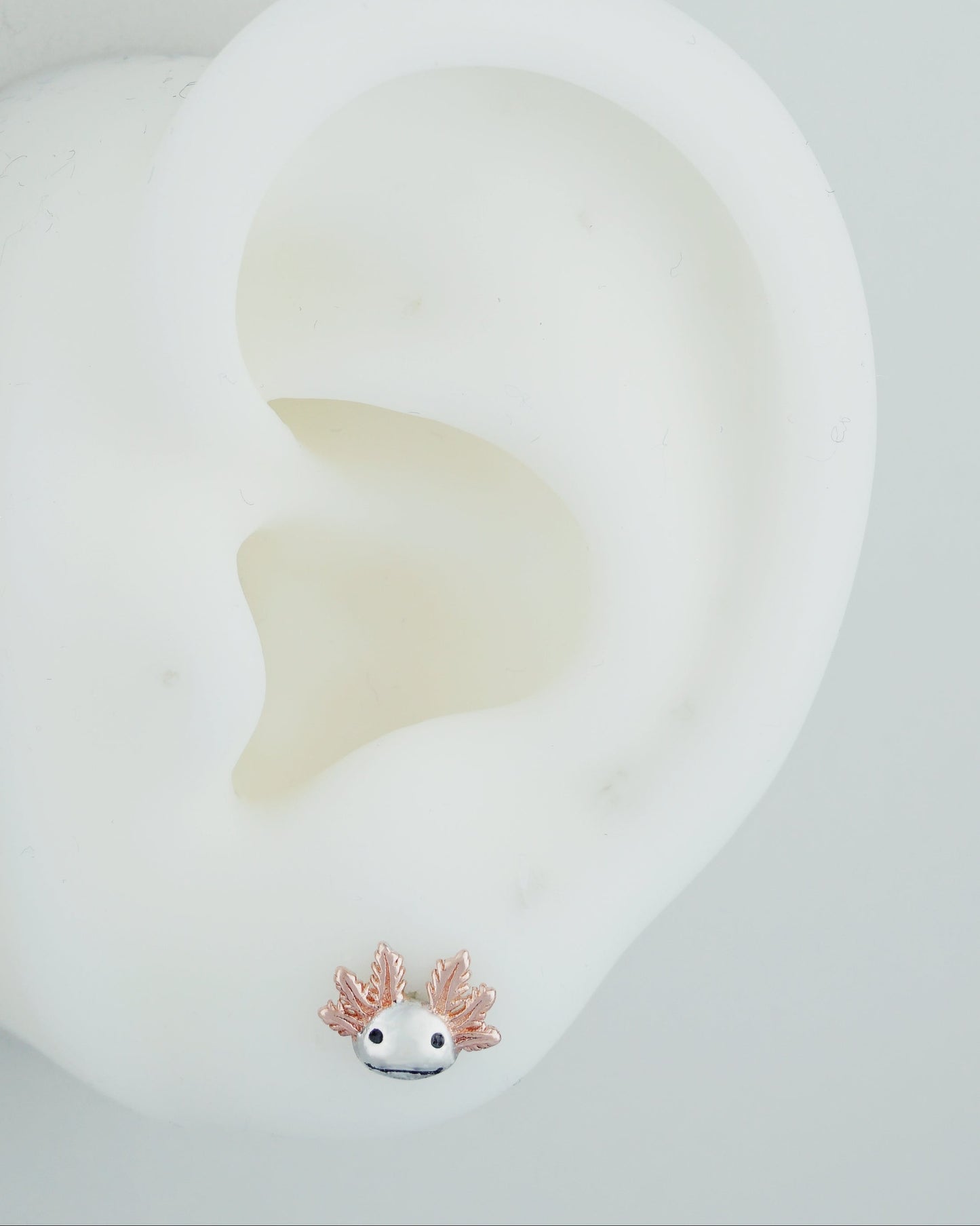 Pair of Tiny Axolotl Stud Earrings in Sterling Silver with Rose Gold Plated External Gill Stalk