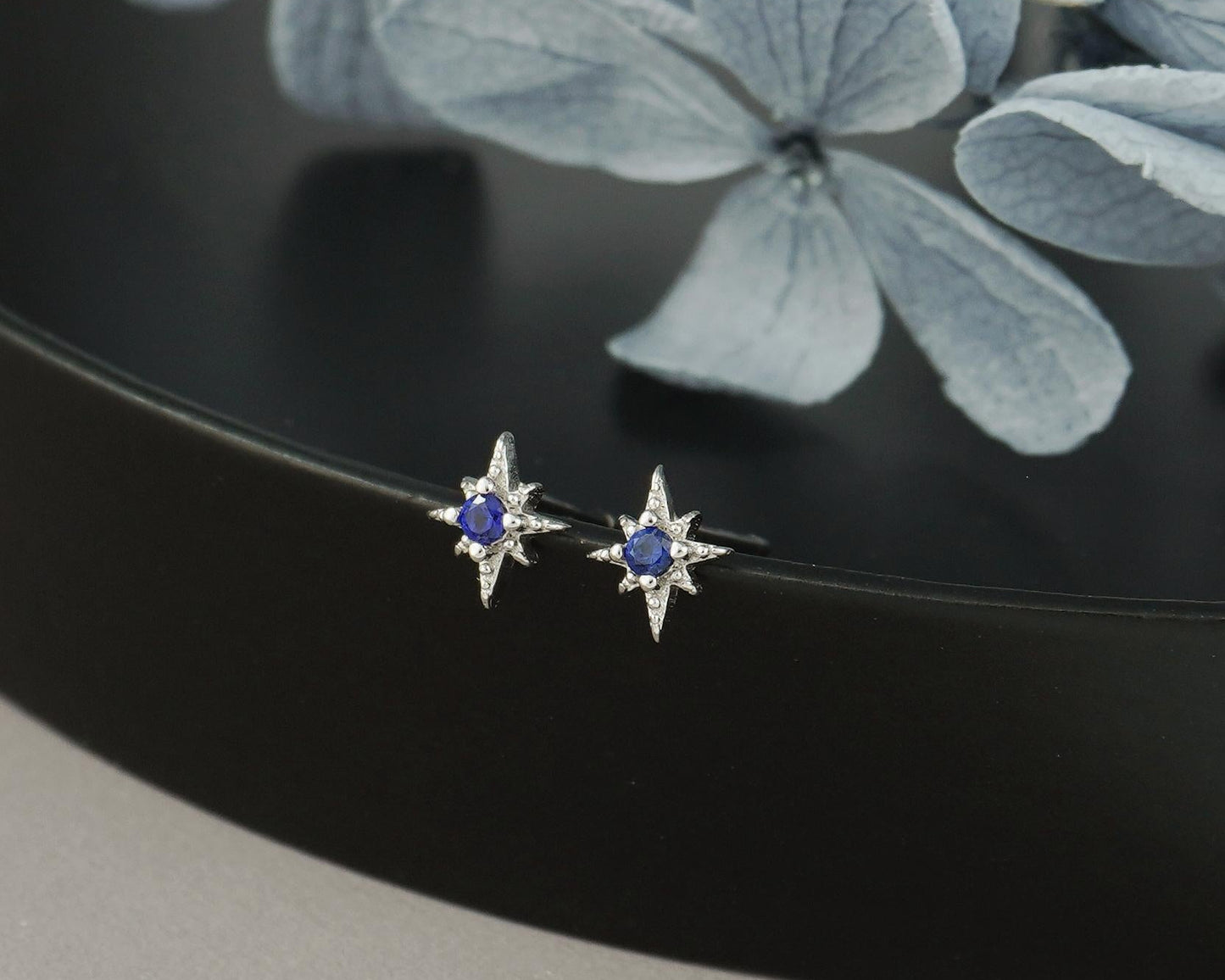 Pair of Tiny Sterling Silver Starburst Stud Earrings in Rhodium or Gold Plated, Celestial Star Burst Design with Blue CZ