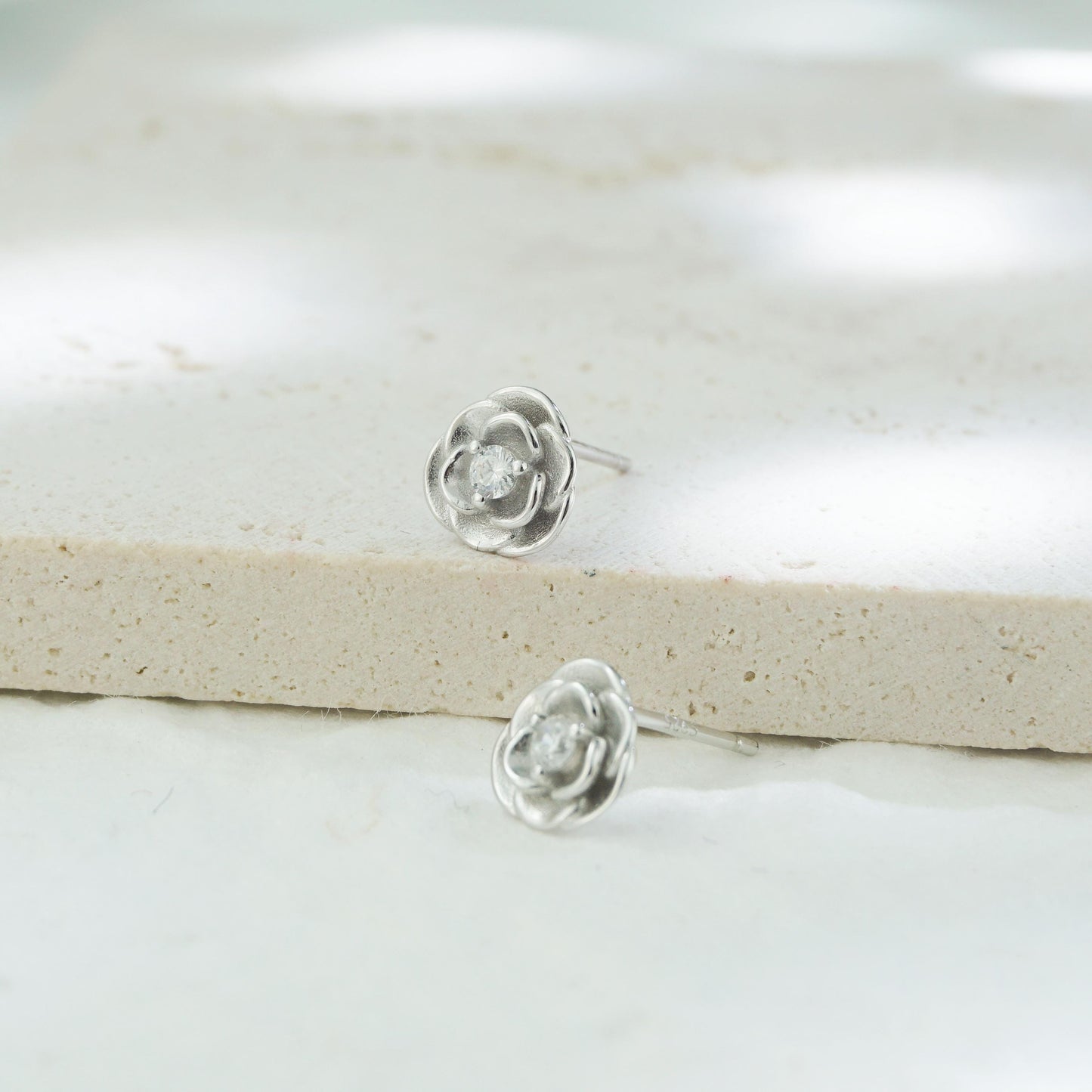 Pair of Camellia Flower Stud Earrings in Sterling Silver with CZ Crystal