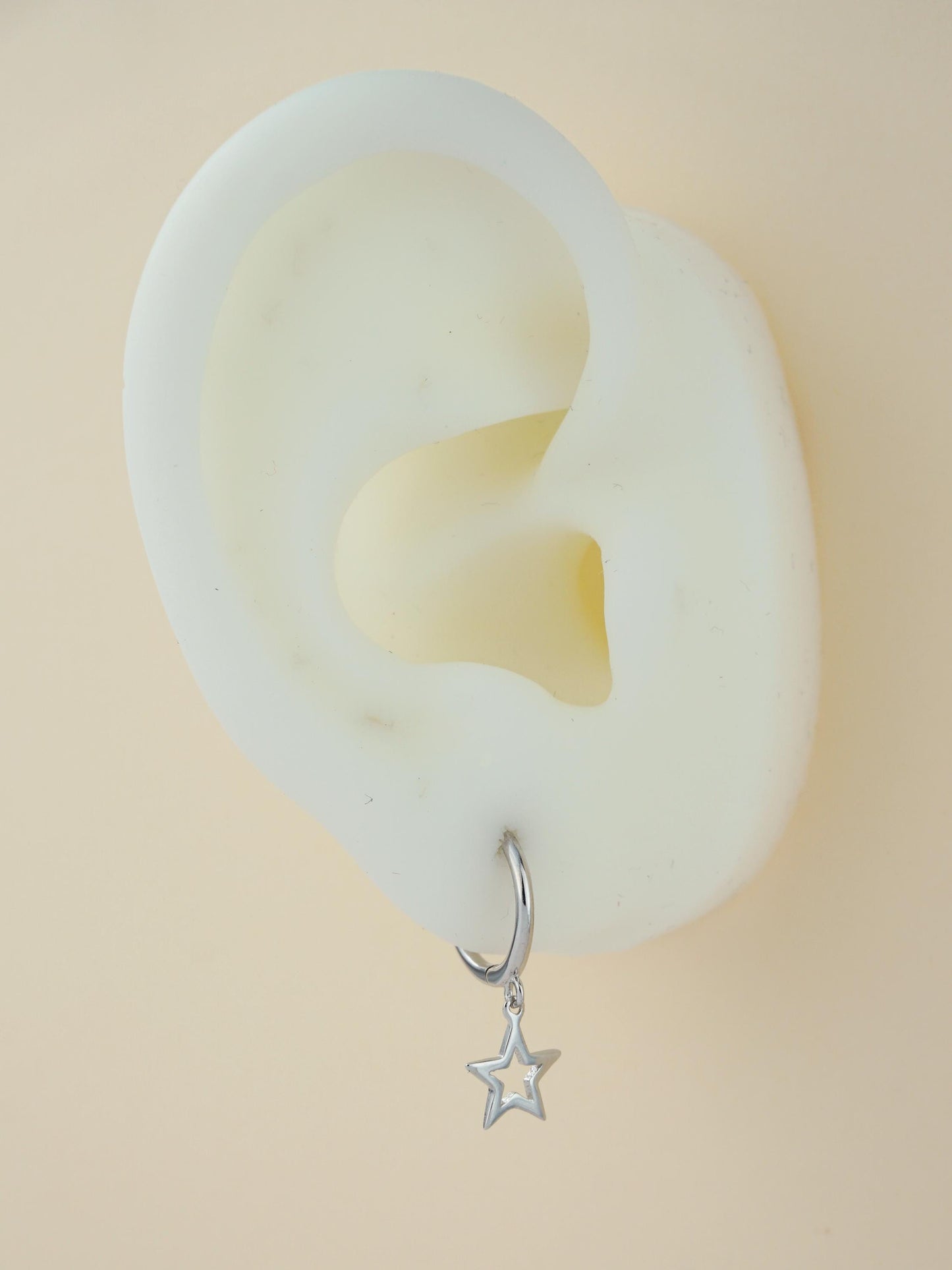 Pair of Dangly Open Star Huggie Hoop Earrings in Sterling Silver or Plated Gold