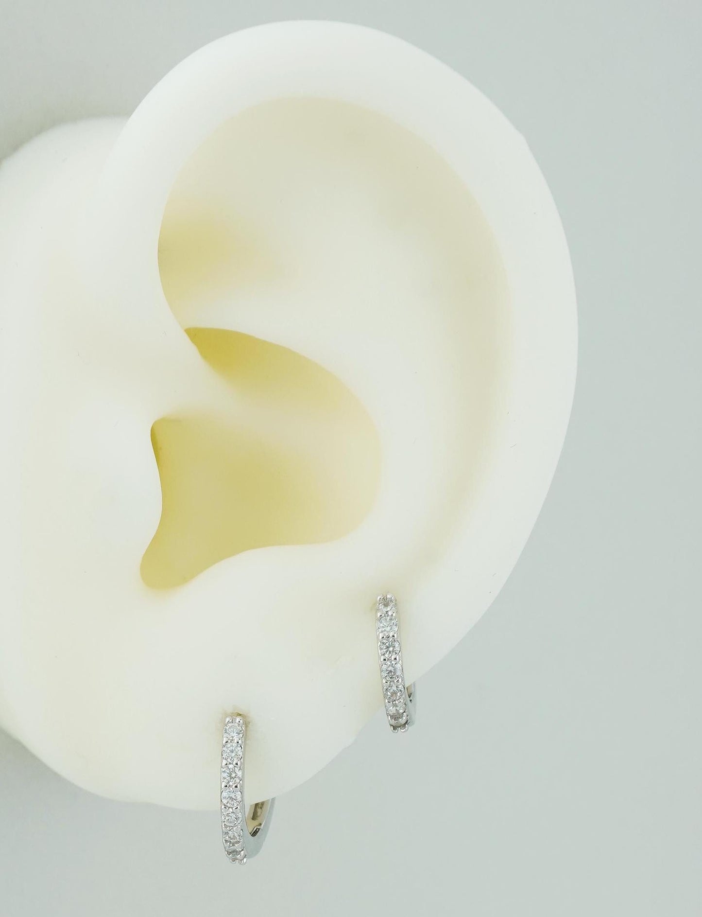 Pair of Skinny CZ Paved Huggie Hoop Earrings in 2 Sizes, Rhodium Plated over Solid Sterling Silver